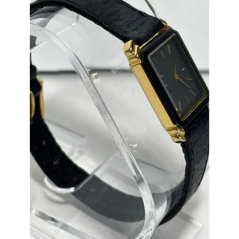 Vintage Seiko 2P20-5000 gold tone women's watch with black leather, working